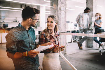 two business people in discussion at work
